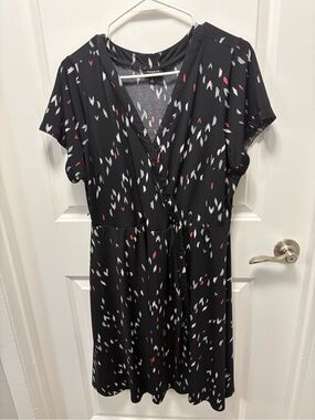 TORRID Black Printed Short Sleeve Wrap Dress with Red & White Accents.